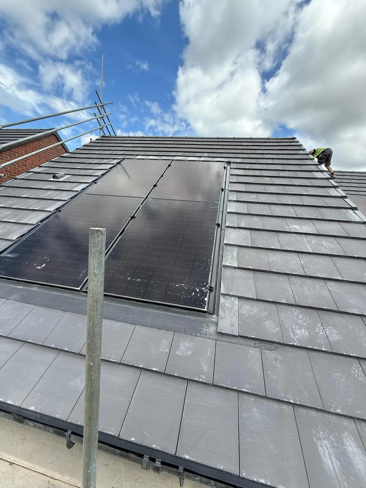 Residential pitched roof with integrated solar PV array on the Hay Lane, Spennymoor development.