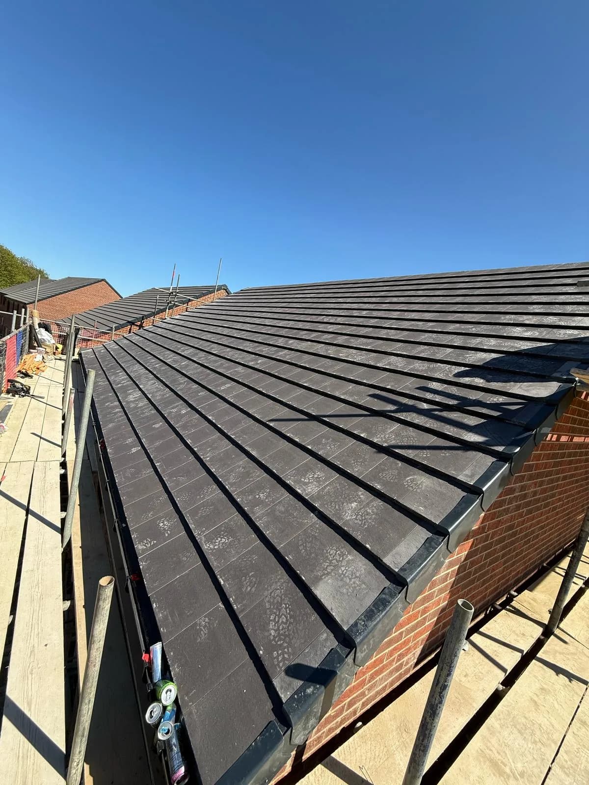Completed pitched tiled roof on a new-build plot at Hay Lane, Spennymoor delivered by Evenii.