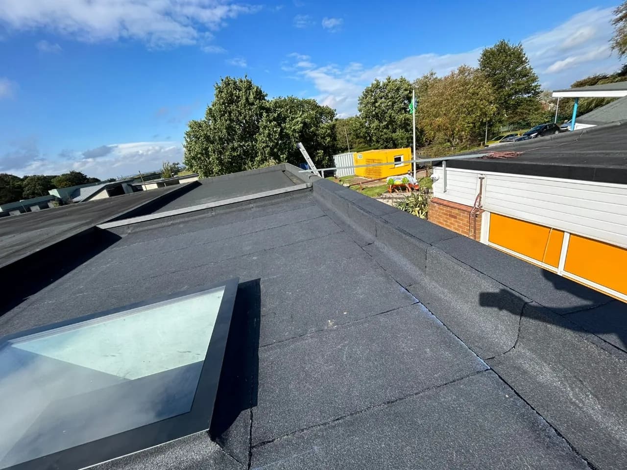 New rooflight set into the completed built-up flat roof covering at Normanby Primary School, Middlesbrough.