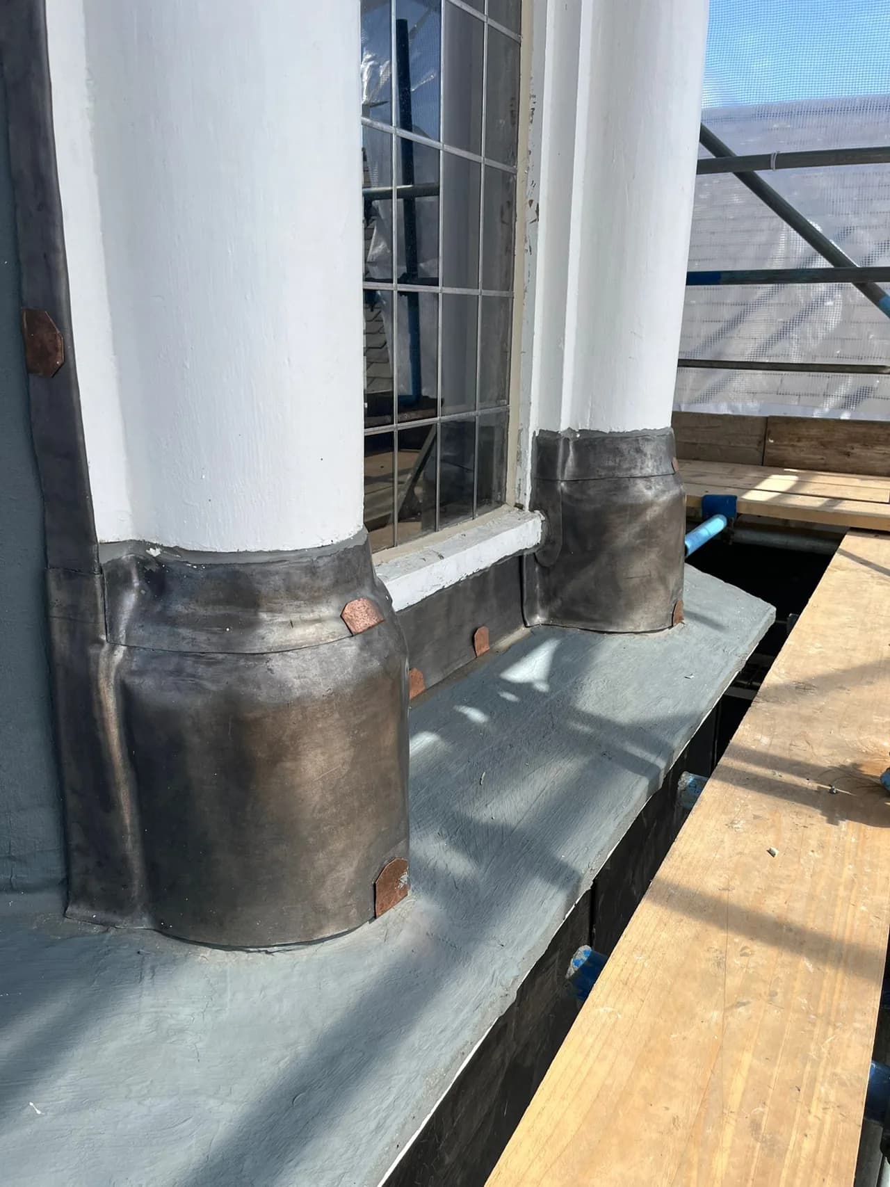 New lead cover flashings and copper wind-restraint straps on the restored O2 Institute Digbeth cupola.