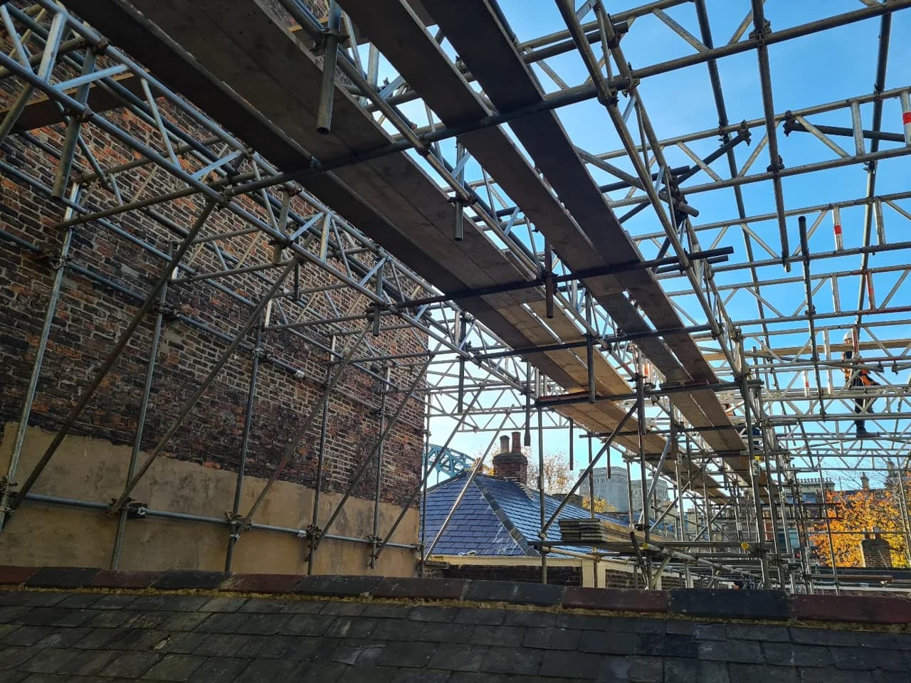 Tented scaffolding erected over the Chapel and Masters Rooms at Trinity House Newcastle for the listed-building roof refurbishment.