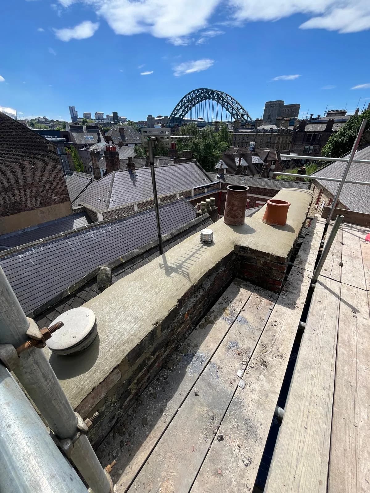 Lead valley dressed between natural slate slopes — Newcastle heritage leadwork